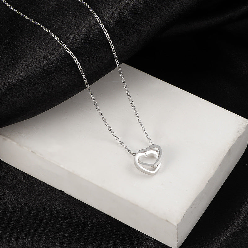 Entangled Hearts Pendant Necklace
