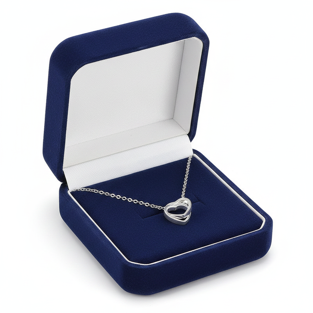 Entangled Hearts Pendant in blue velvet jewelry box