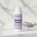 Jovel Nadora Hydrate & Glow Serum on marble surface